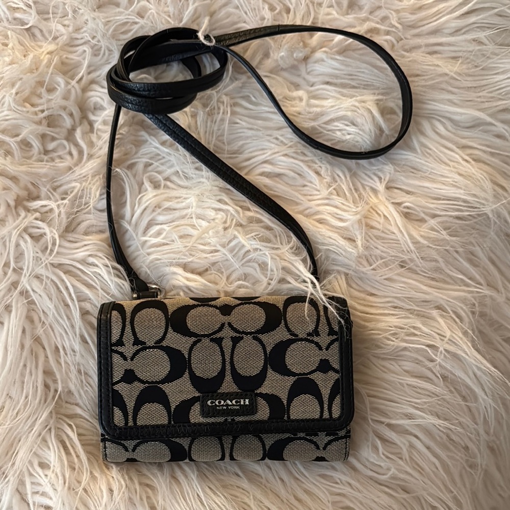 Coach Signature Wallet Black and Cream Crossbody Bag with Flap Closure